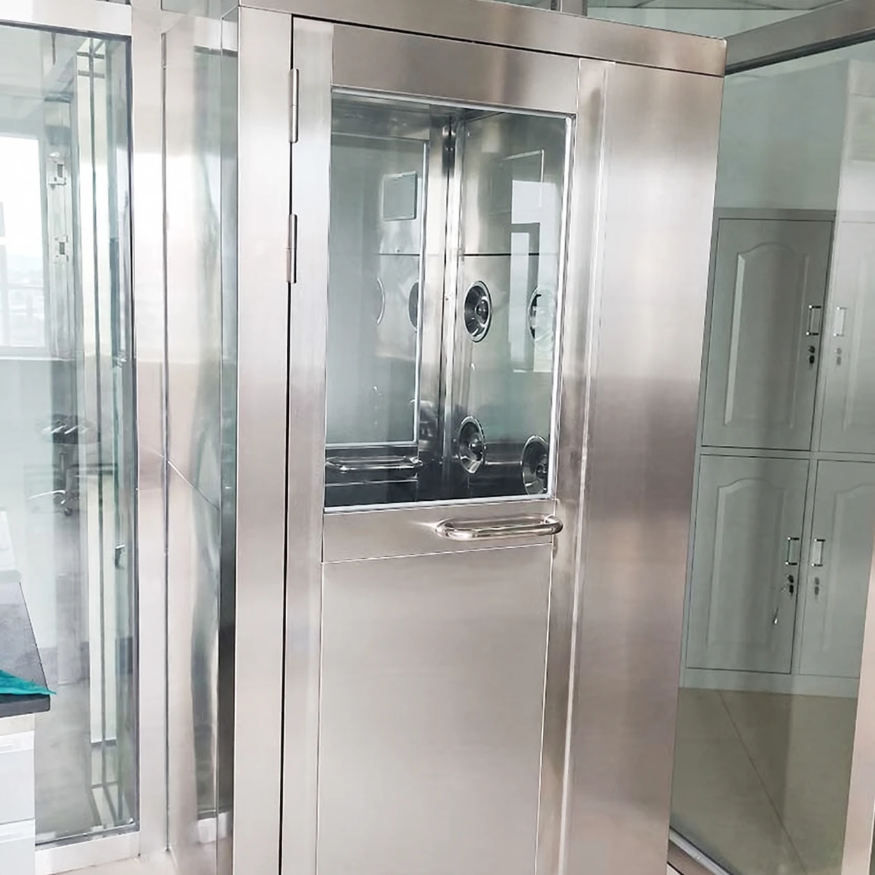 Stainless cleanroom air shower at a controlled entrance