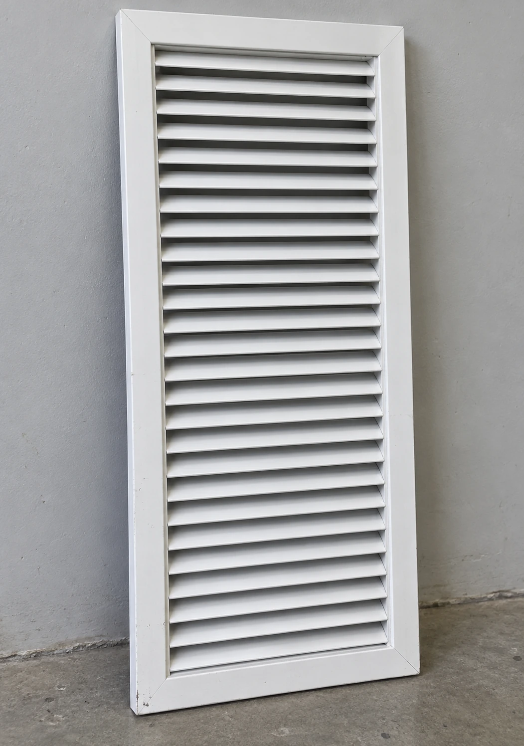 Tall narrow fourteen-by-thirty white wall return grille with horizontal blades