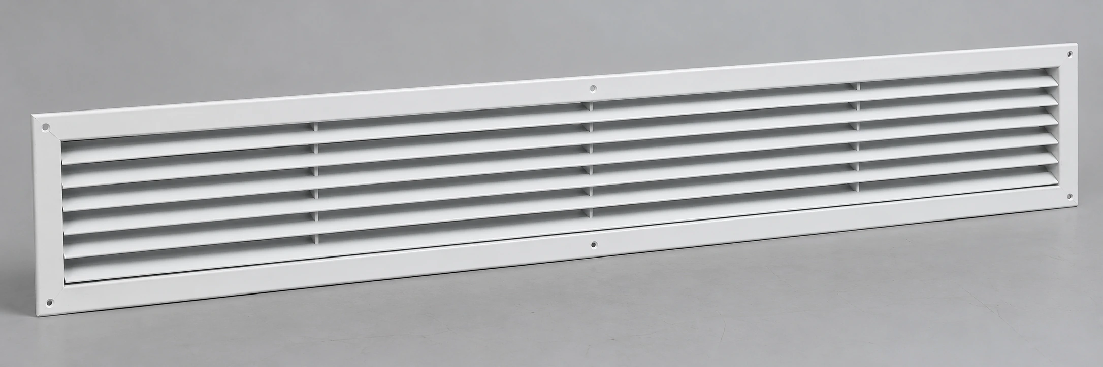 Wide narrow white steel return grille with horizontal fixed louvers and screw flange