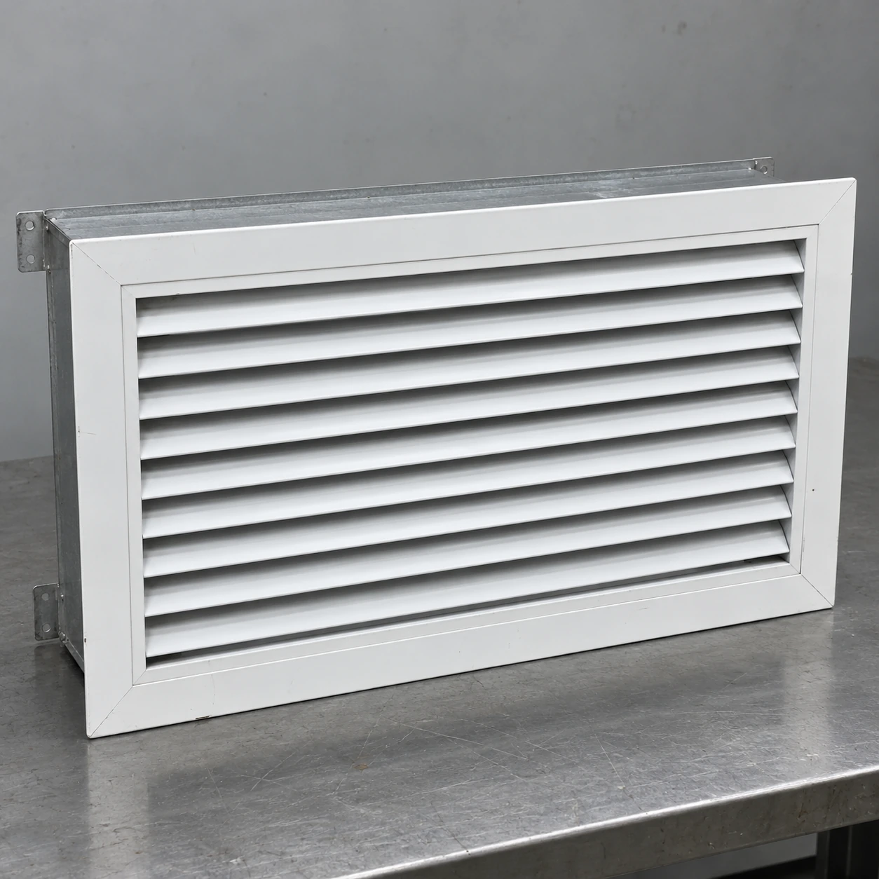 White removable louvered return face for a commercial air-conditioning unit