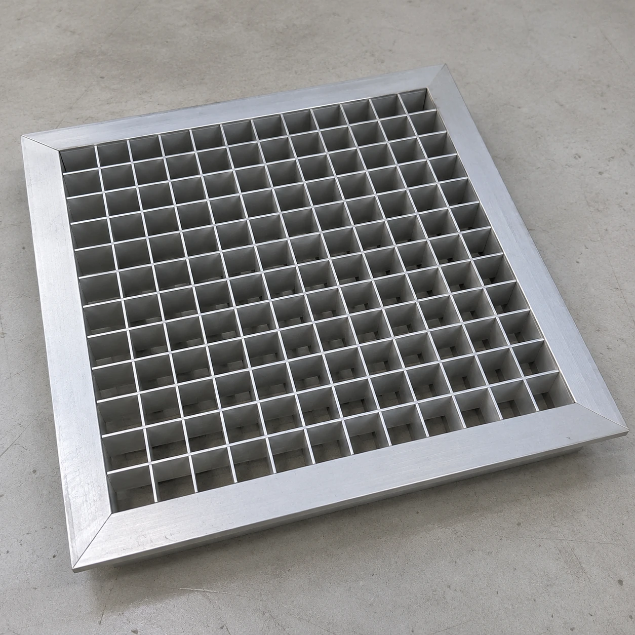 Aluminium egg-crate return grille with deep square cells and a plain angle frame