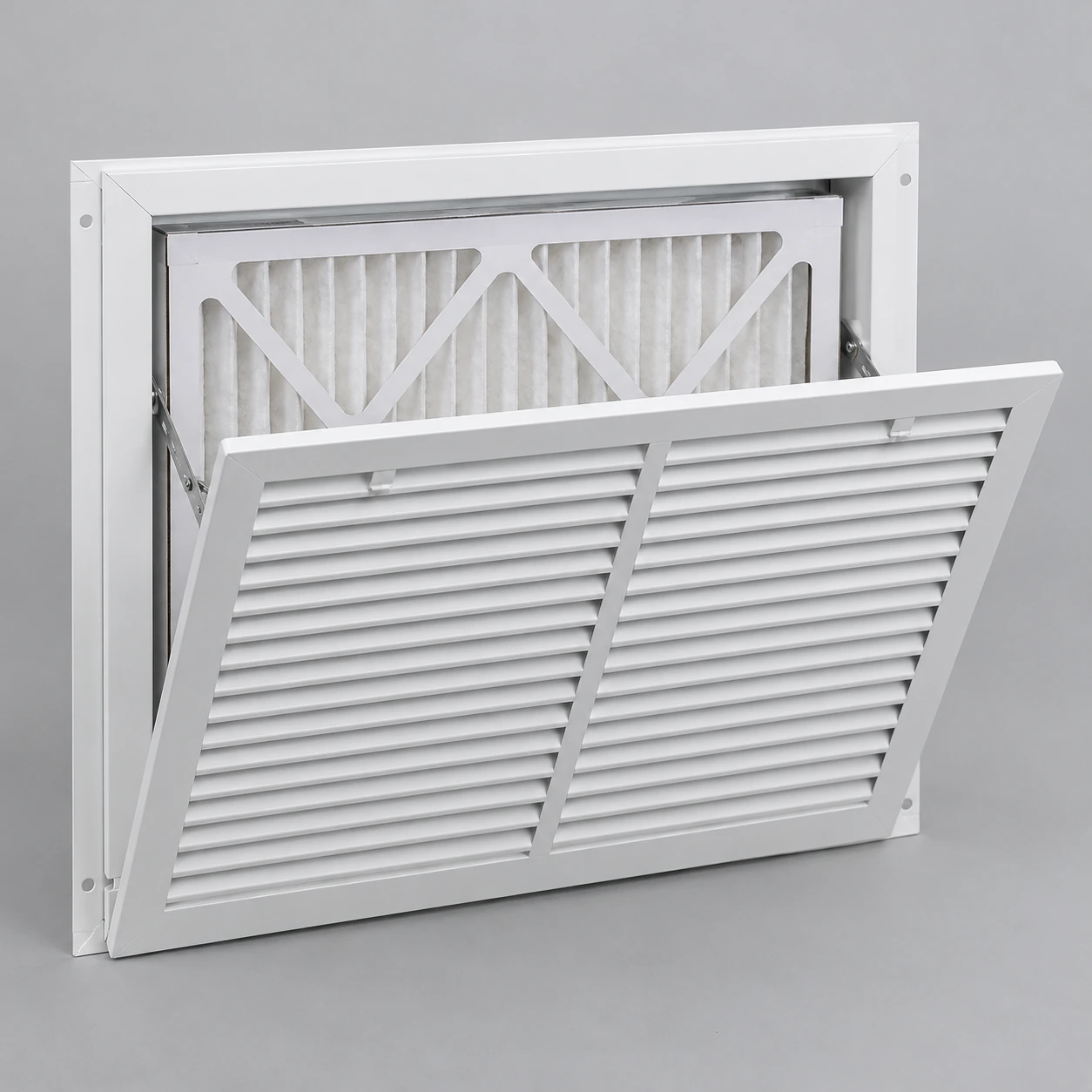 Filter return grille with an open louvered face and a retained pleated panel filter