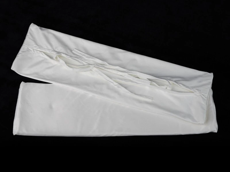 Opened microfiber cover beside the sponge insert
