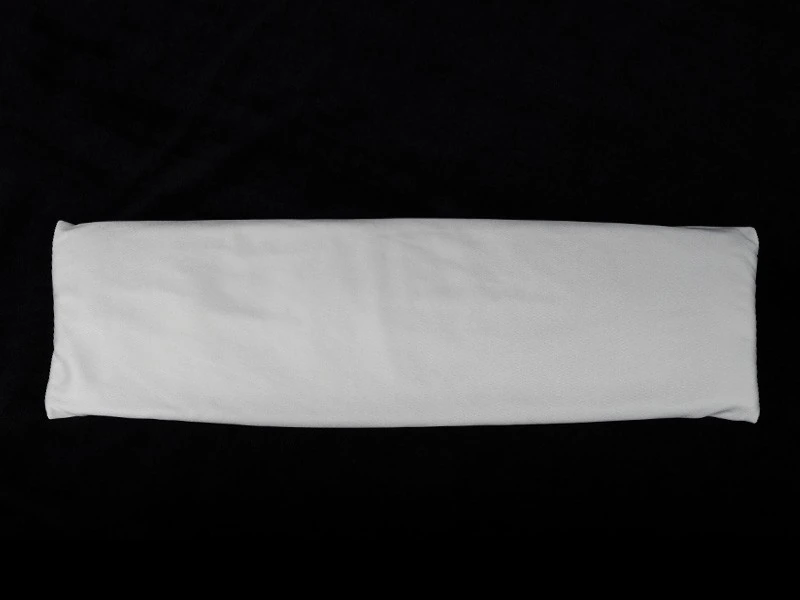 Rectangular sponge insert wrapped in white fabric