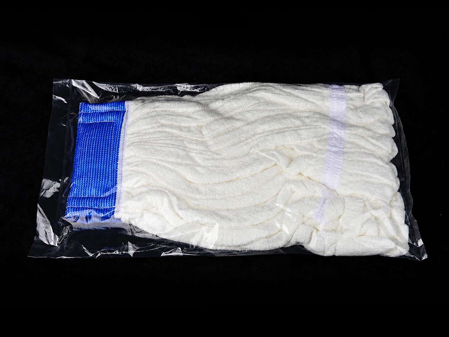 Strip mop refill in clear protective packaging
